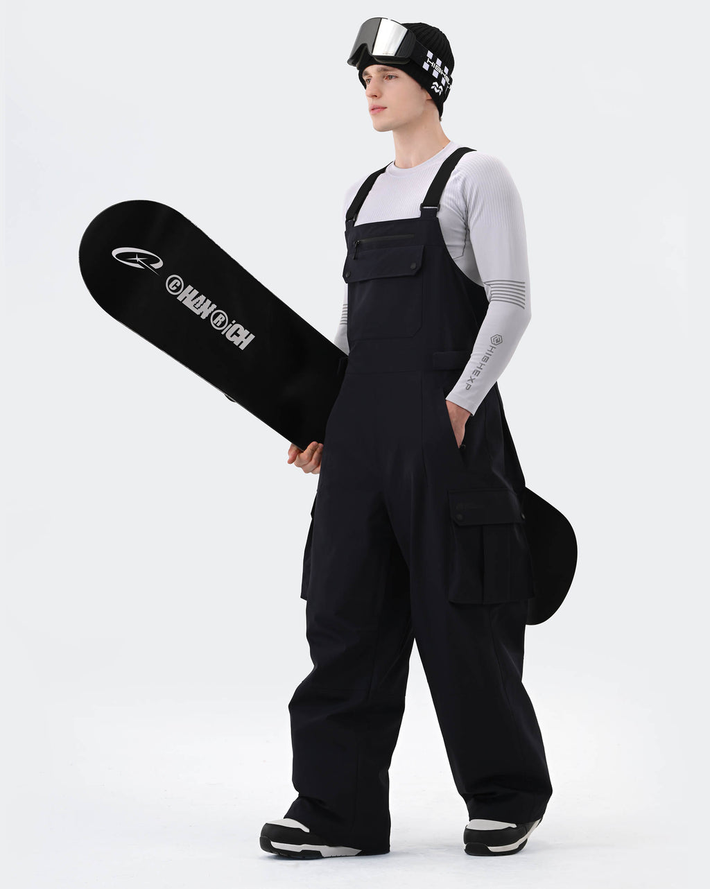 Navy Blue ski bib pants zippered pocket and cuff detail
