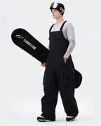 Navy Blue ski bib pants zippered pocket and cuff detail
