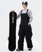 Men wearing Navy Blue 3-layer baggy snowboard bibs powder day
