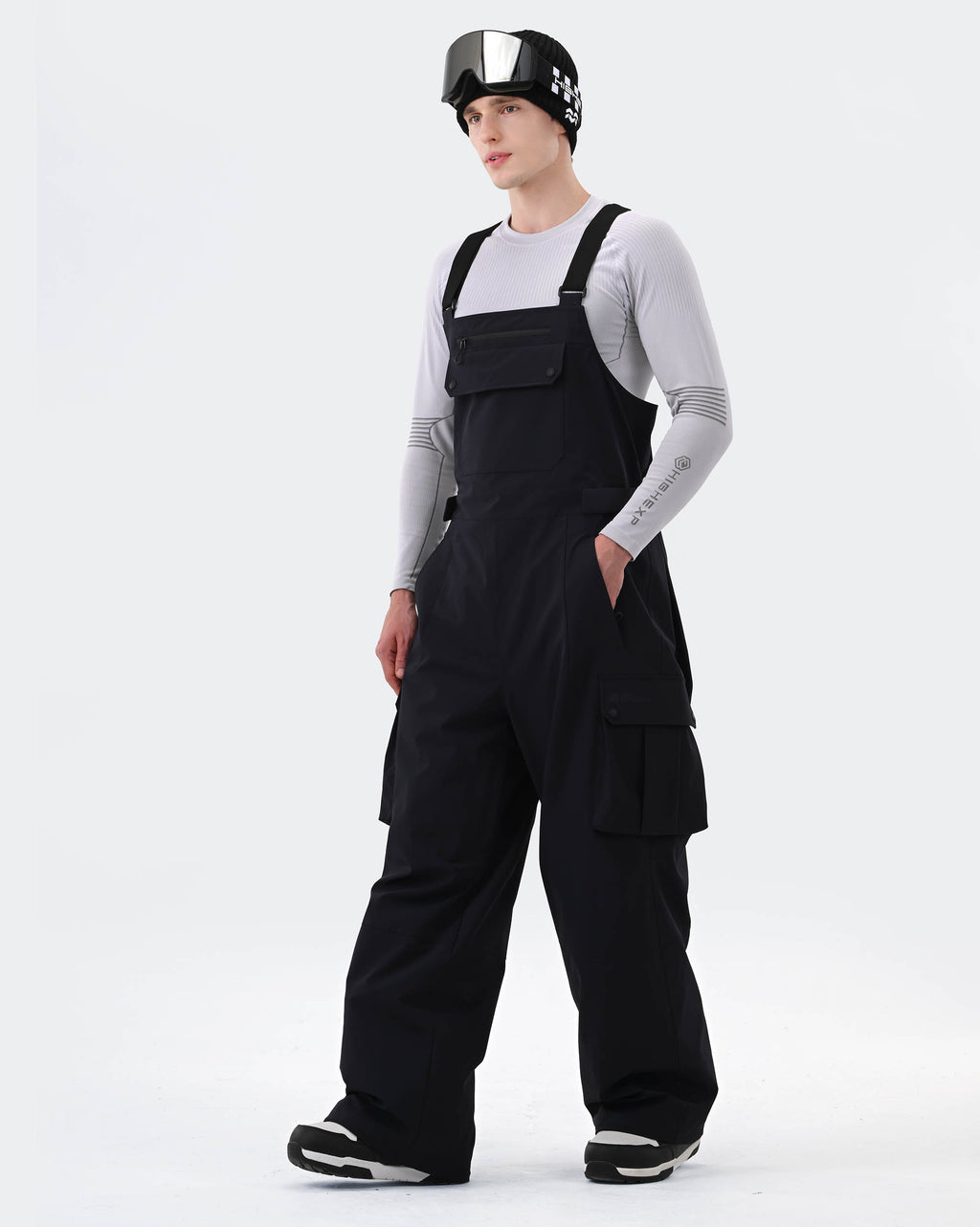 Navy Blue baggy ski bib pants side view showing abrasion-resistant outer layer
