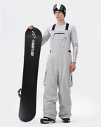 Men wearing Gray 3-layer baggy ski bib pants backcountry adventure
