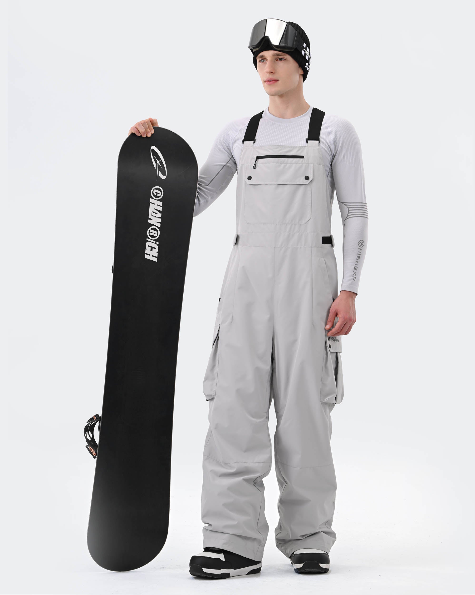 Men wearing Gray 3-layer baggy ski bib pants backcountry adventure
