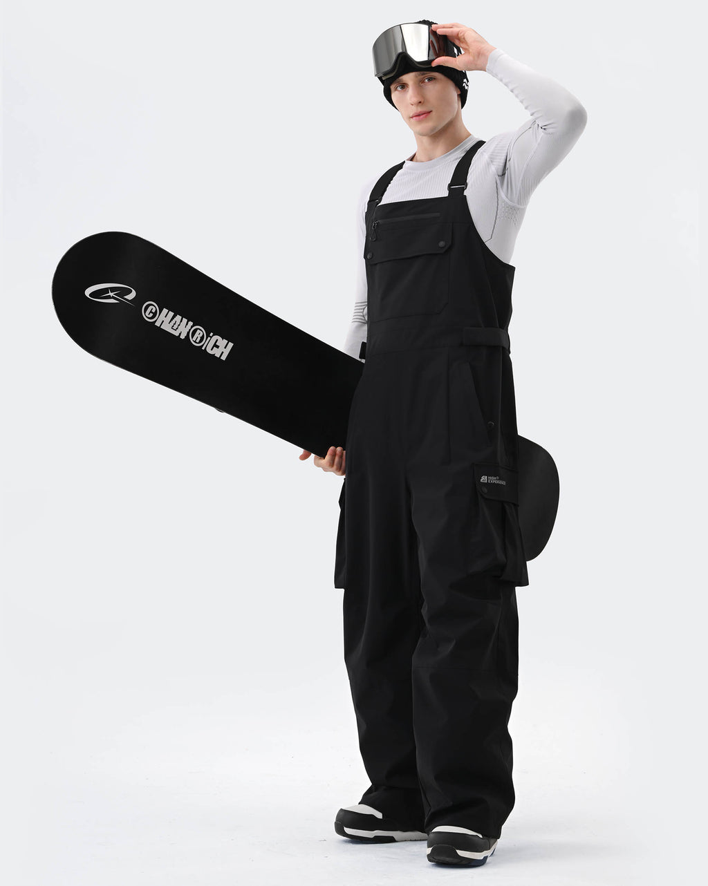 Black ski bib pants taped seam and cuff detail – HIGH EXPERIENCE
