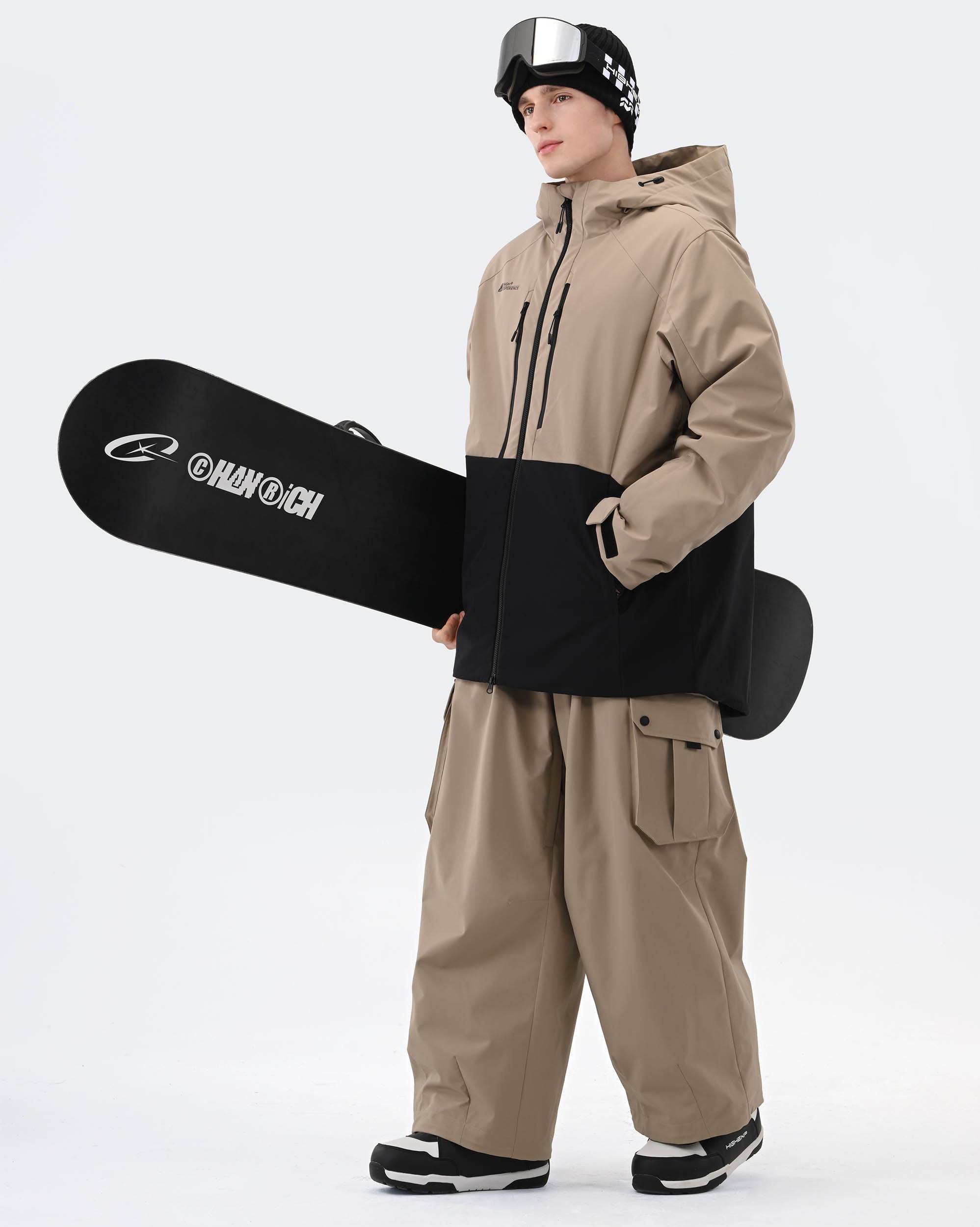 Light Khaki ski jacket taped seam and adjustable hem detail
