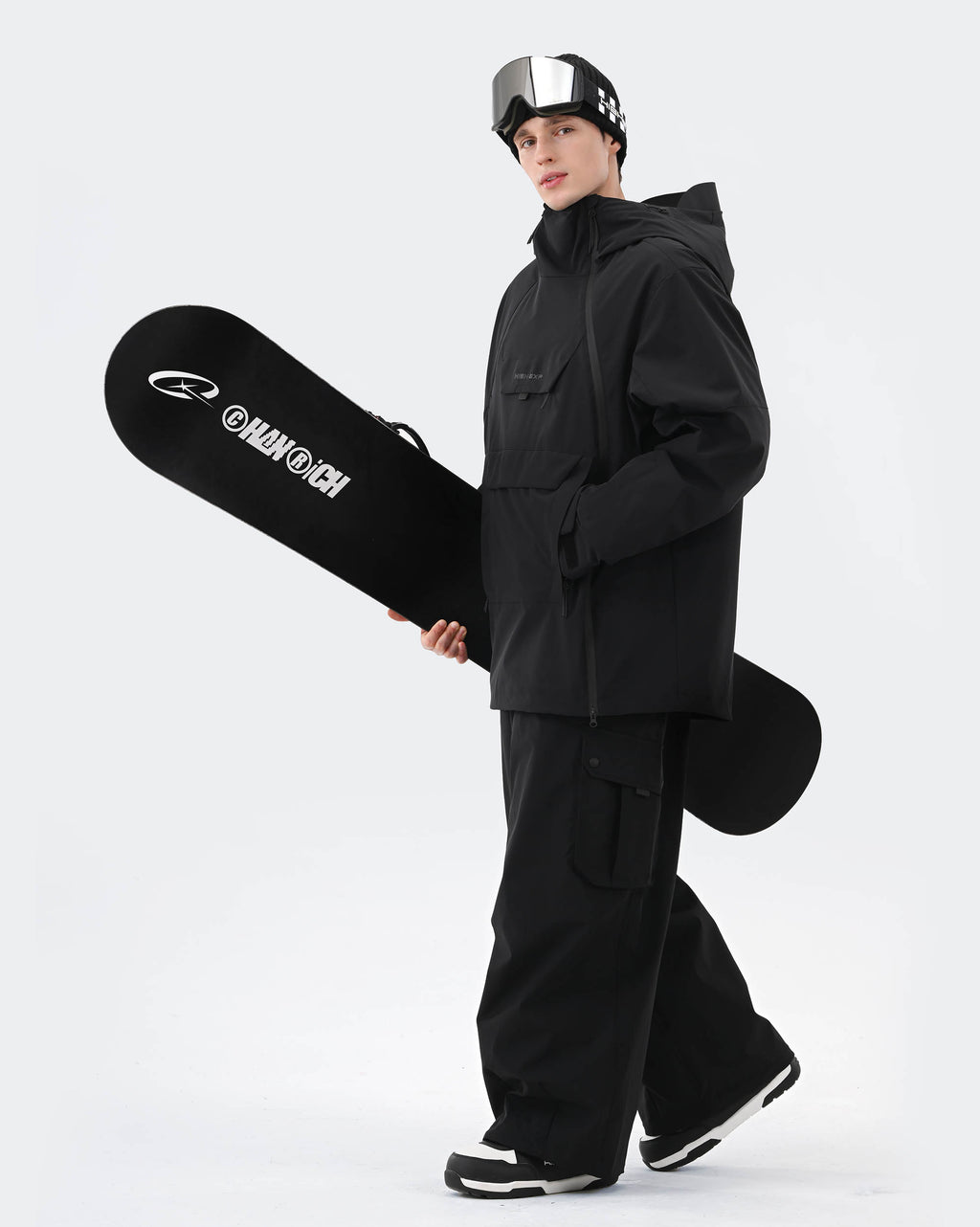 Black ski jacket underarm ventilation zipper and snow skirt detail
