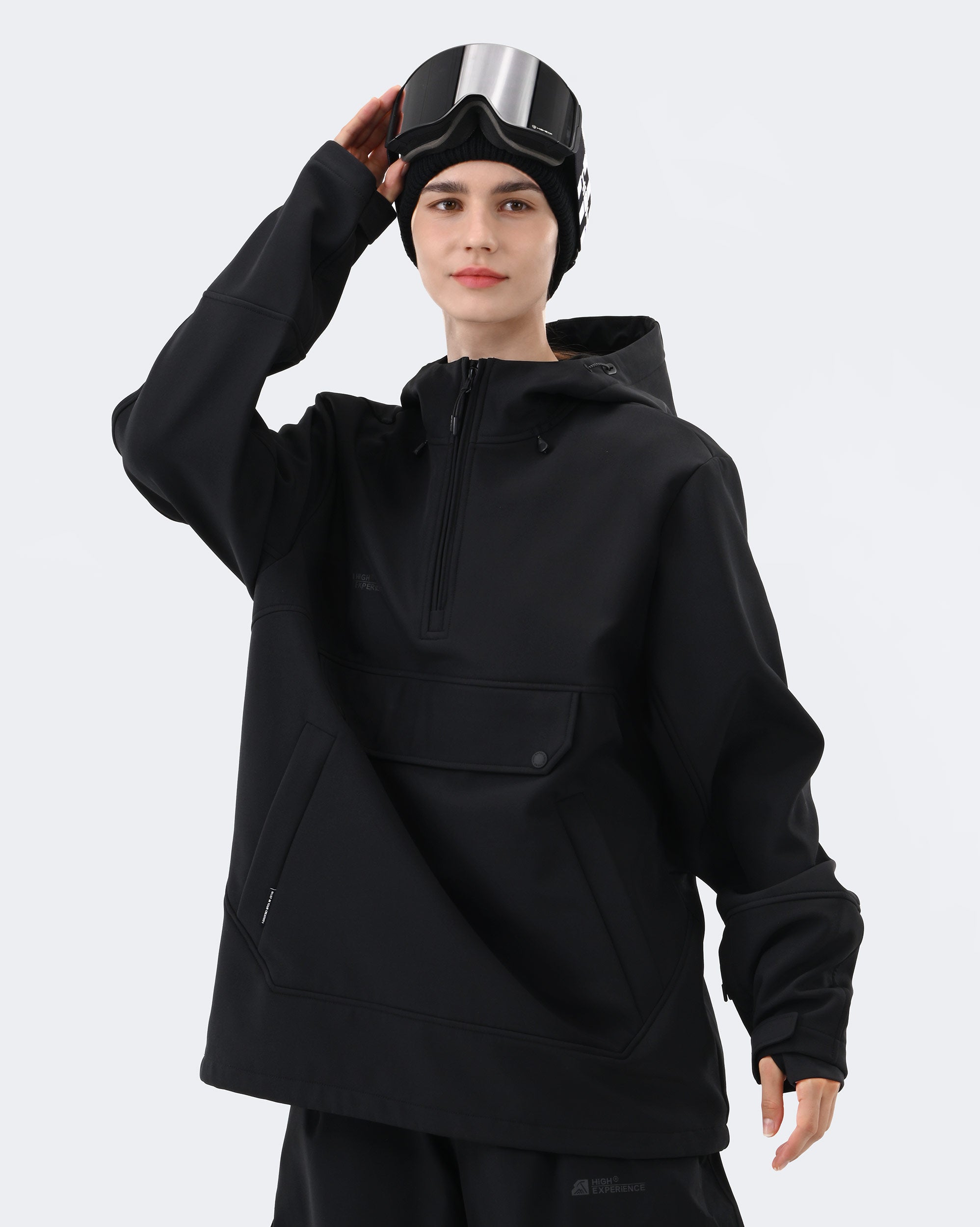 Black ski hoodie side zipper ventilation and chest pocket detail
