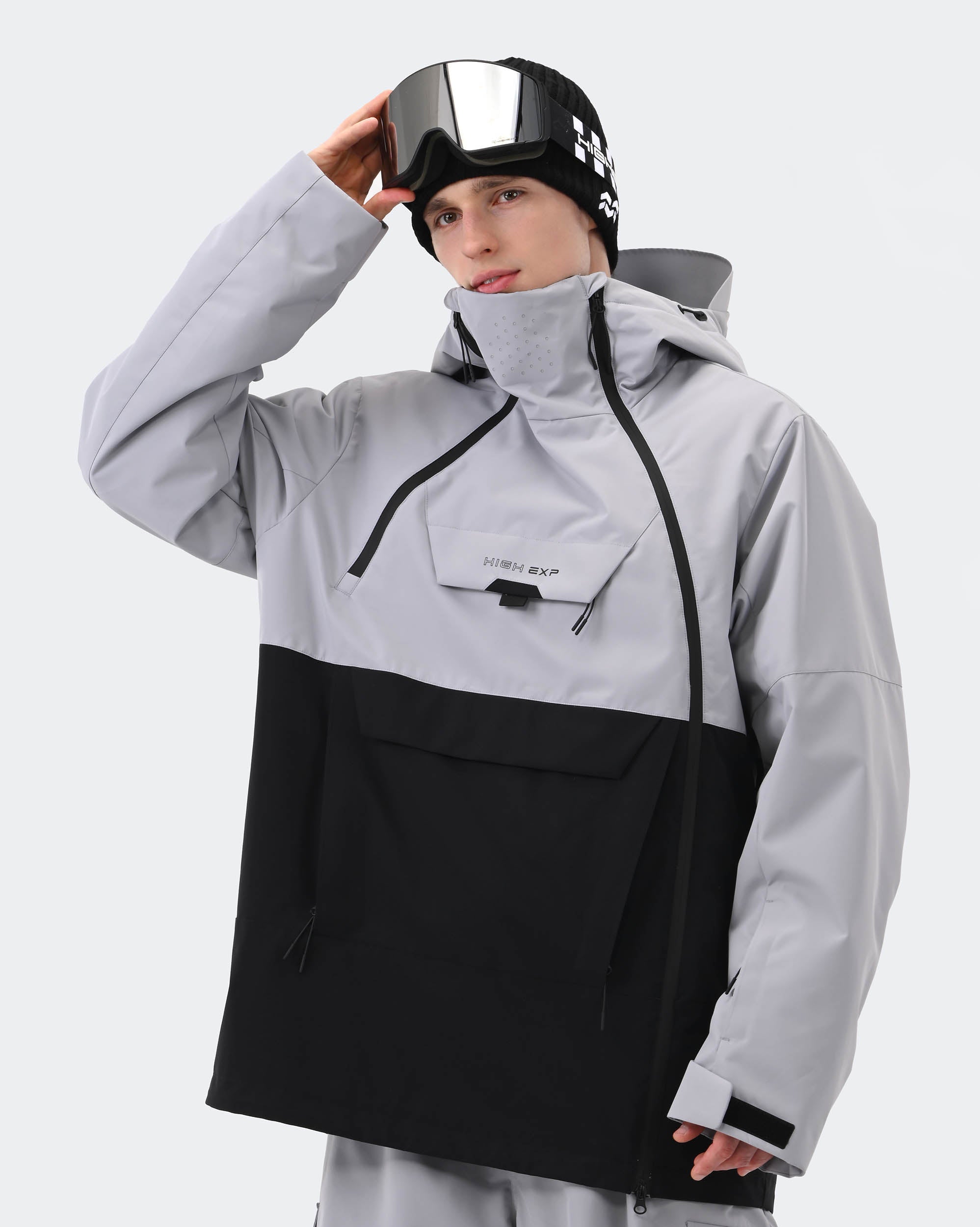 Gray anorak ski jacket side view showing technical 3L fabric construction
