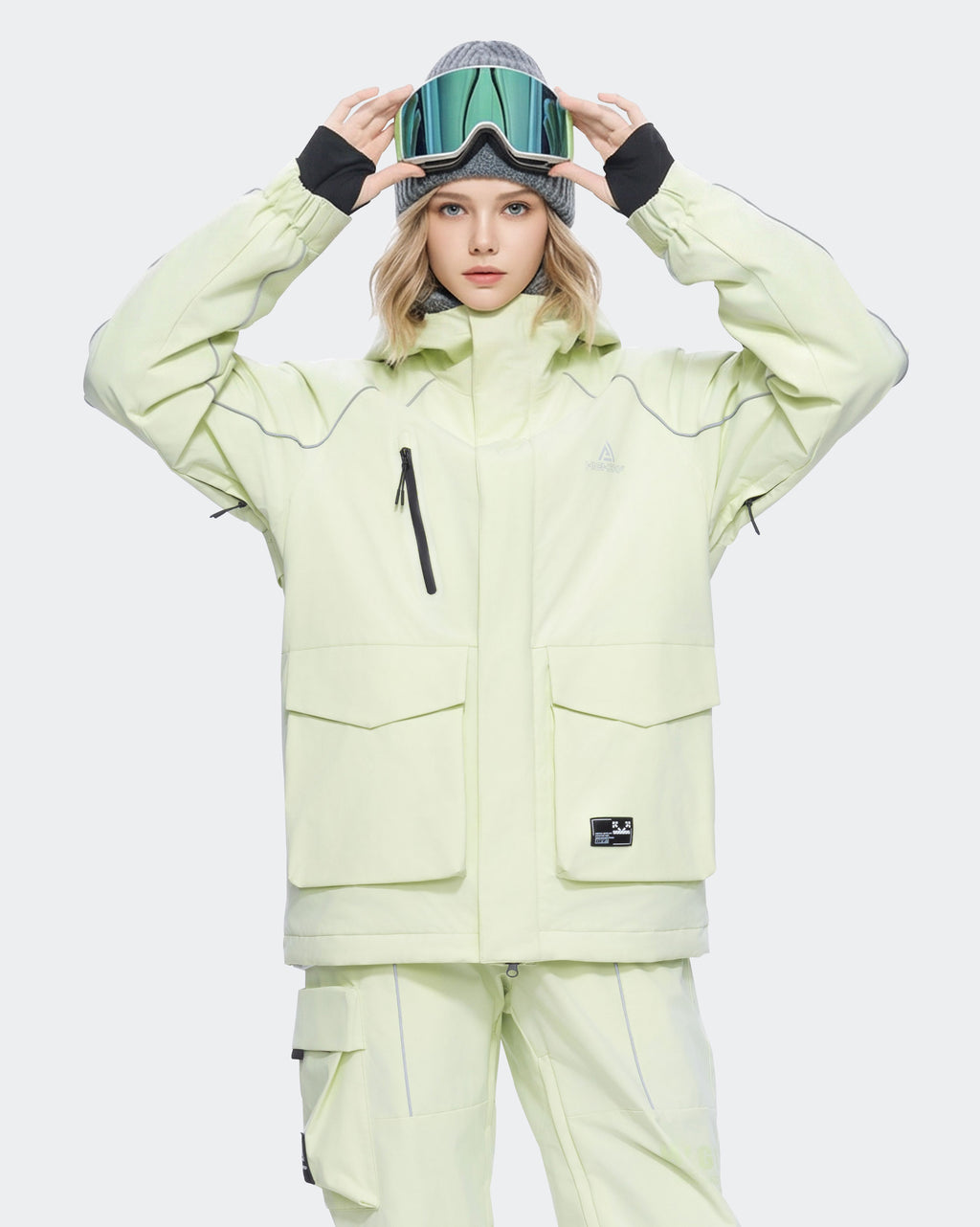 Women's ski jacket front view in Sage Color – baggy waterproof design
