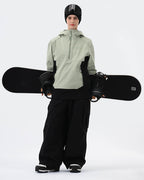 Women wearing Light Green 3L ski jacket with RECCO reflector winter outdoor shot
