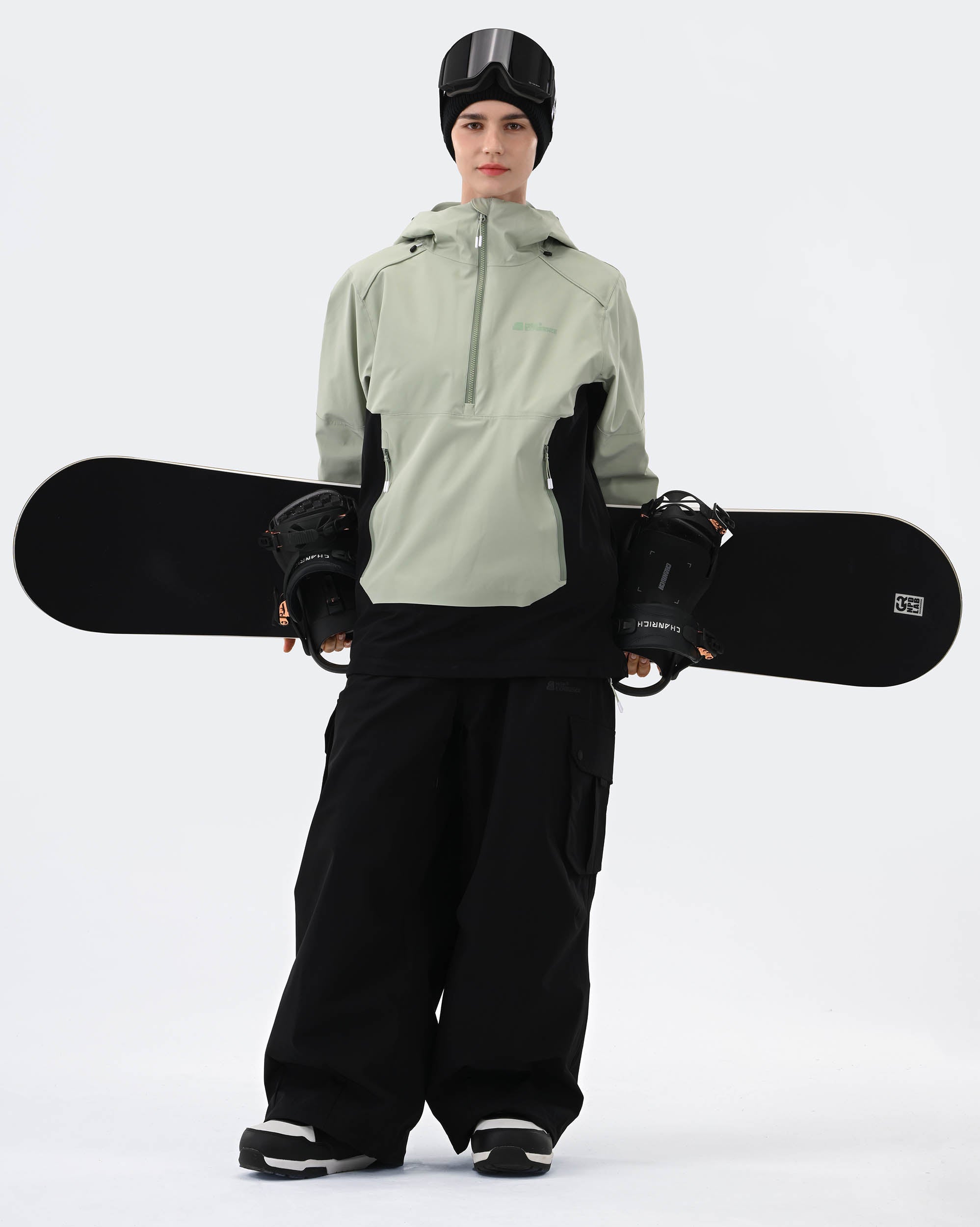 Women wearing Light Green 3L ski jacket with RECCO reflector winter outdoor shot
