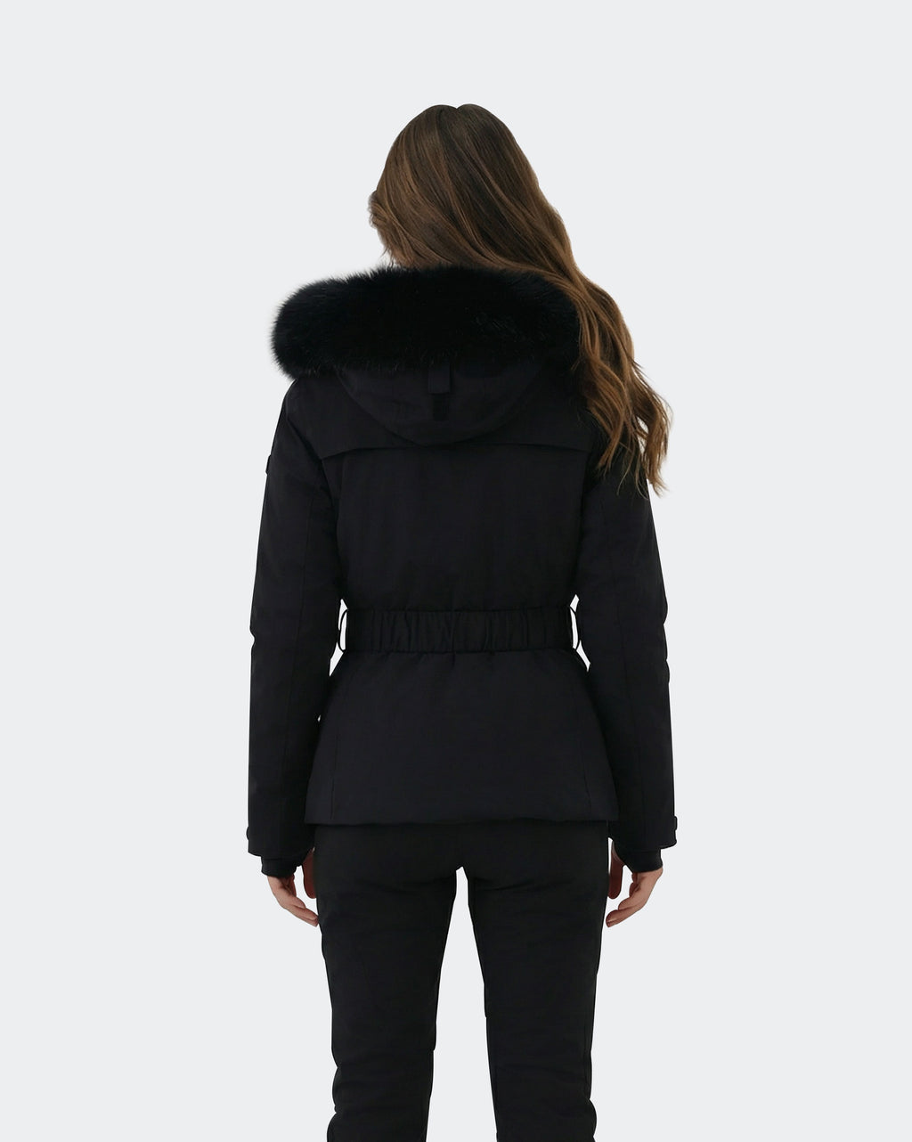 Black fitted ski jacket back view – women's snowboard coat
