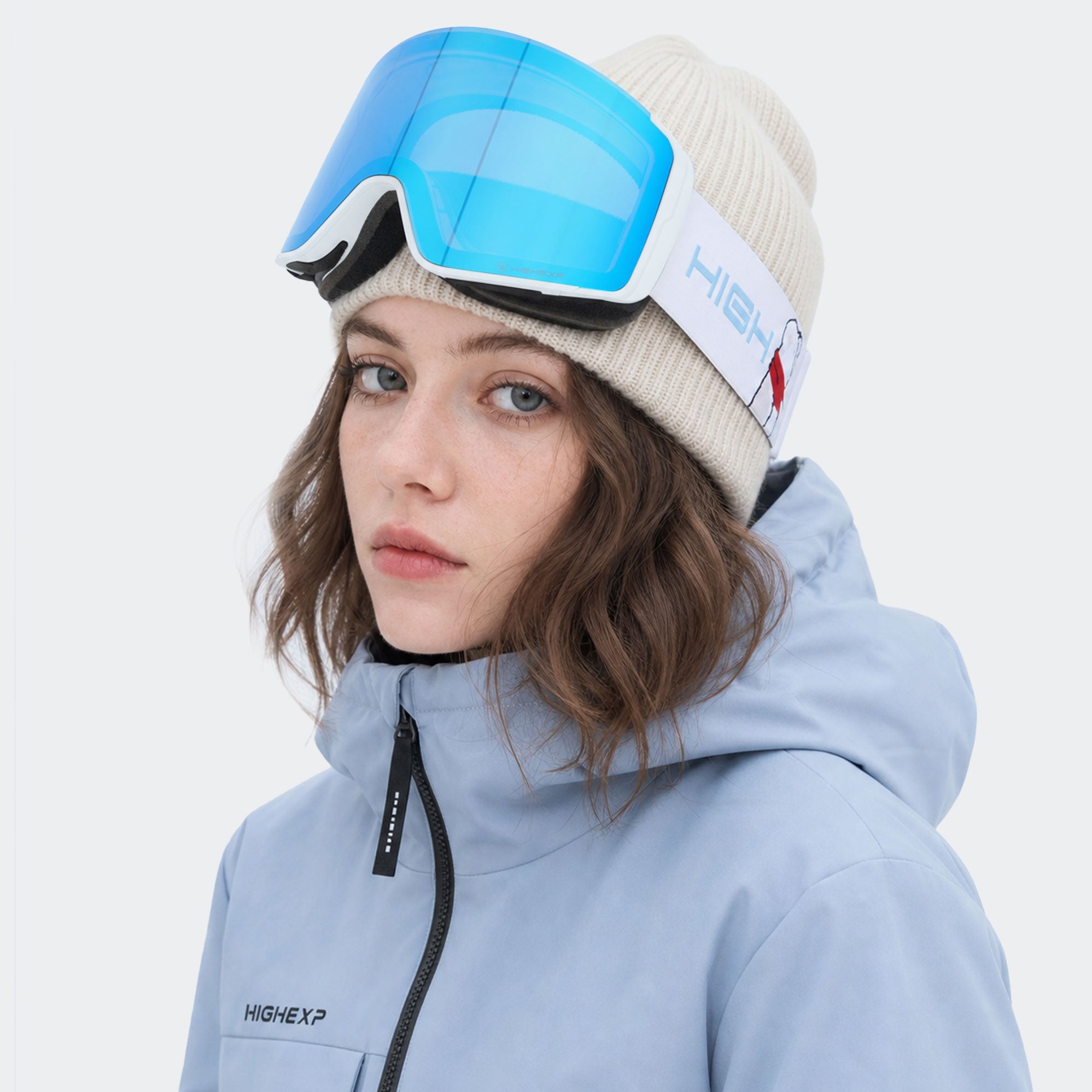High Experience Magnetic Snow Goggles Blue Lens White Frame Model Wearing Side View
