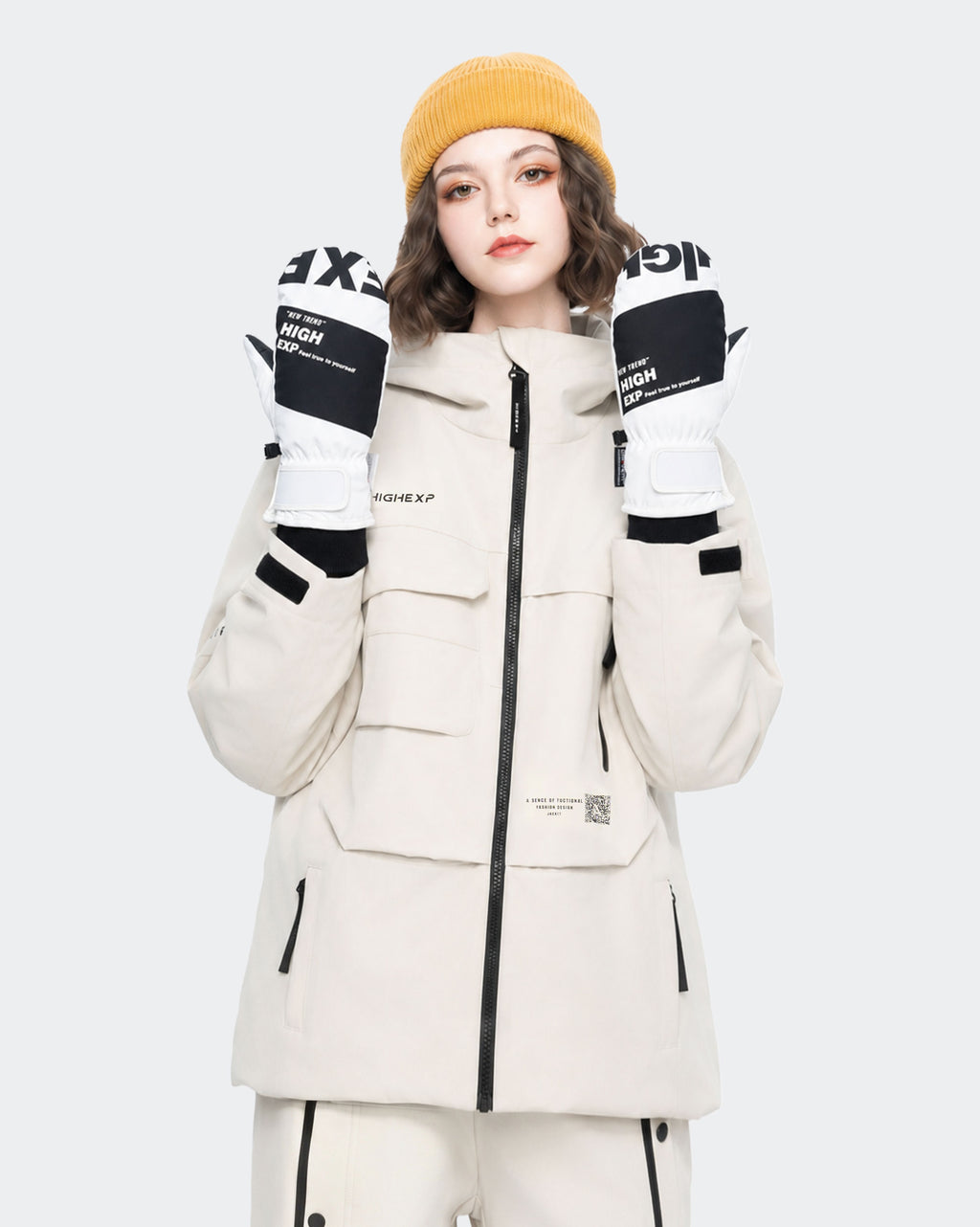 High Experience White Ski Gloves - Female Model Wearing White Ski Jacket for Winter Sports