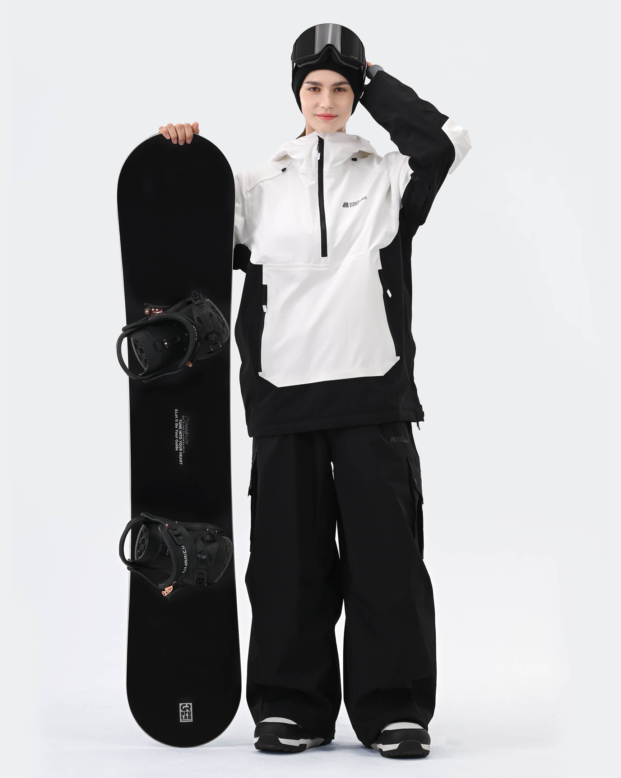 Women wearing White 3L ski jacket with RECCO reflector powder day
