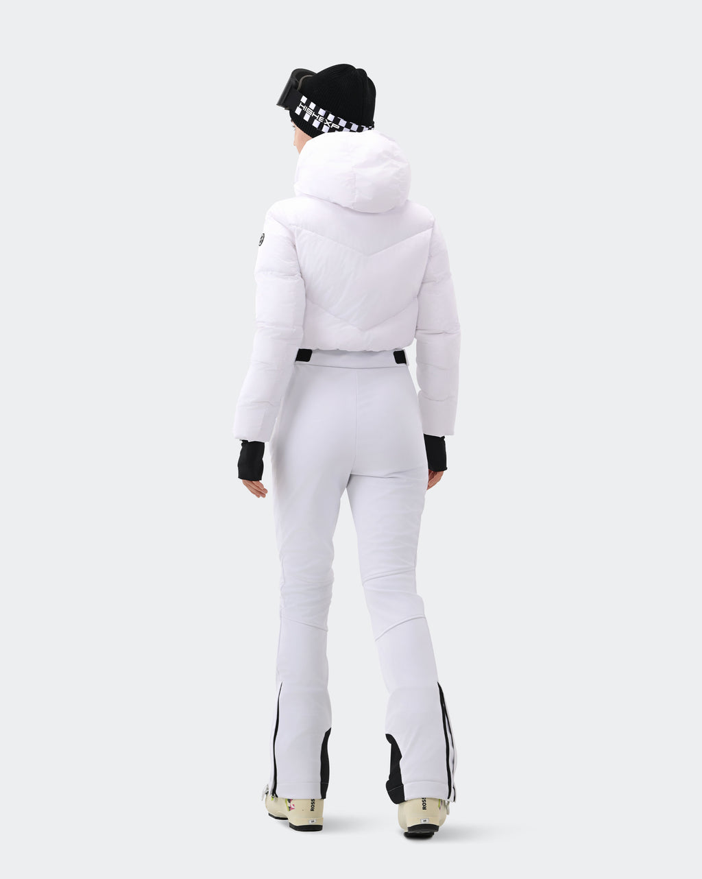 Women's White insulated snowsuit side view showing slim fit silhouette
