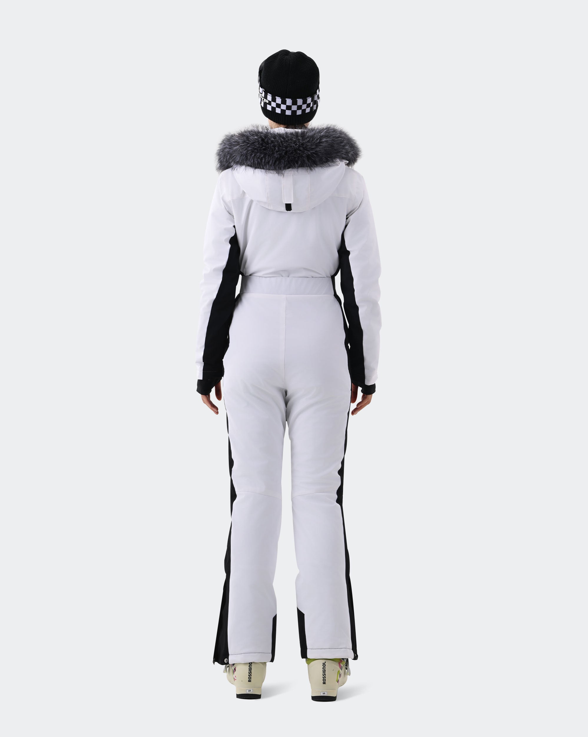 White insulated waterproof snow jumpsuit back view – women's ski onesie
