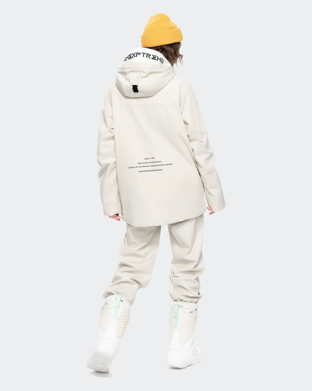 Women's ski jacket back view in Beige – HIGH EXPERIENCE
