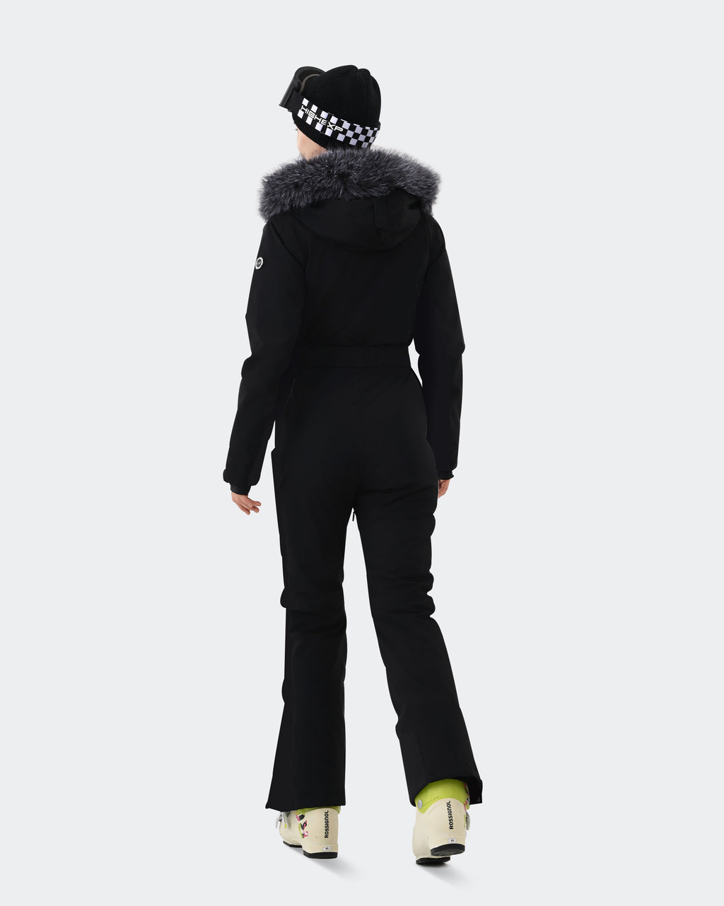 Black insulated waterproof snow jumpsuit back view – women's ski onesie
