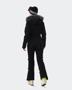 Black insulated waterproof snow jumpsuit back view – women's ski onesie
