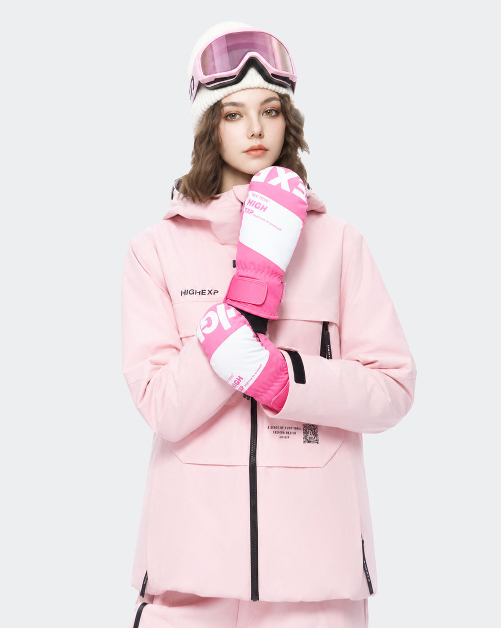 High Experience Pink Ski Gloves - Female Model Wearing Pink Ski Jacket for Winter Sports