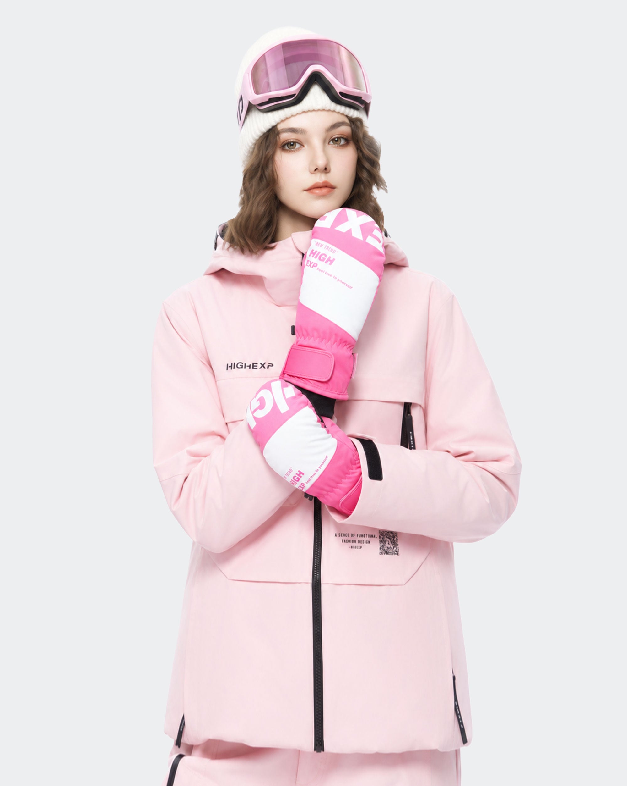 High Experience Pink Ski Gloves - Female Model Wearing Pink Ski Jacket for Winter Sports