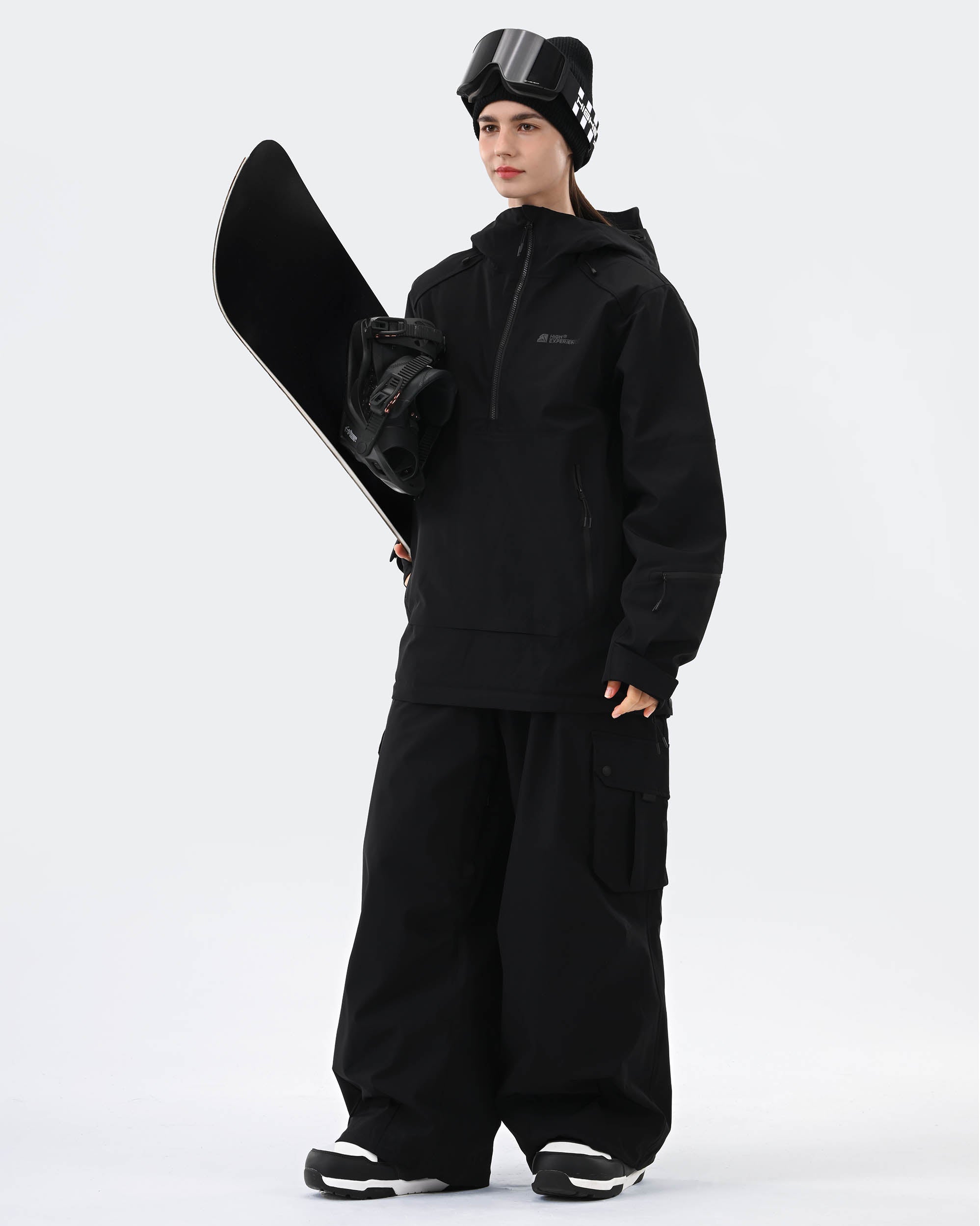 Black ski jacket RECCO reflector label and storm hood detail
