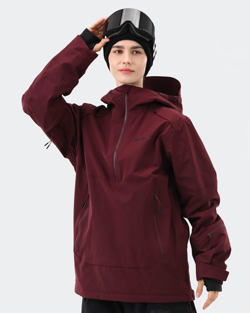 Red 3-layer ski jacket side profile showing windproof construction
