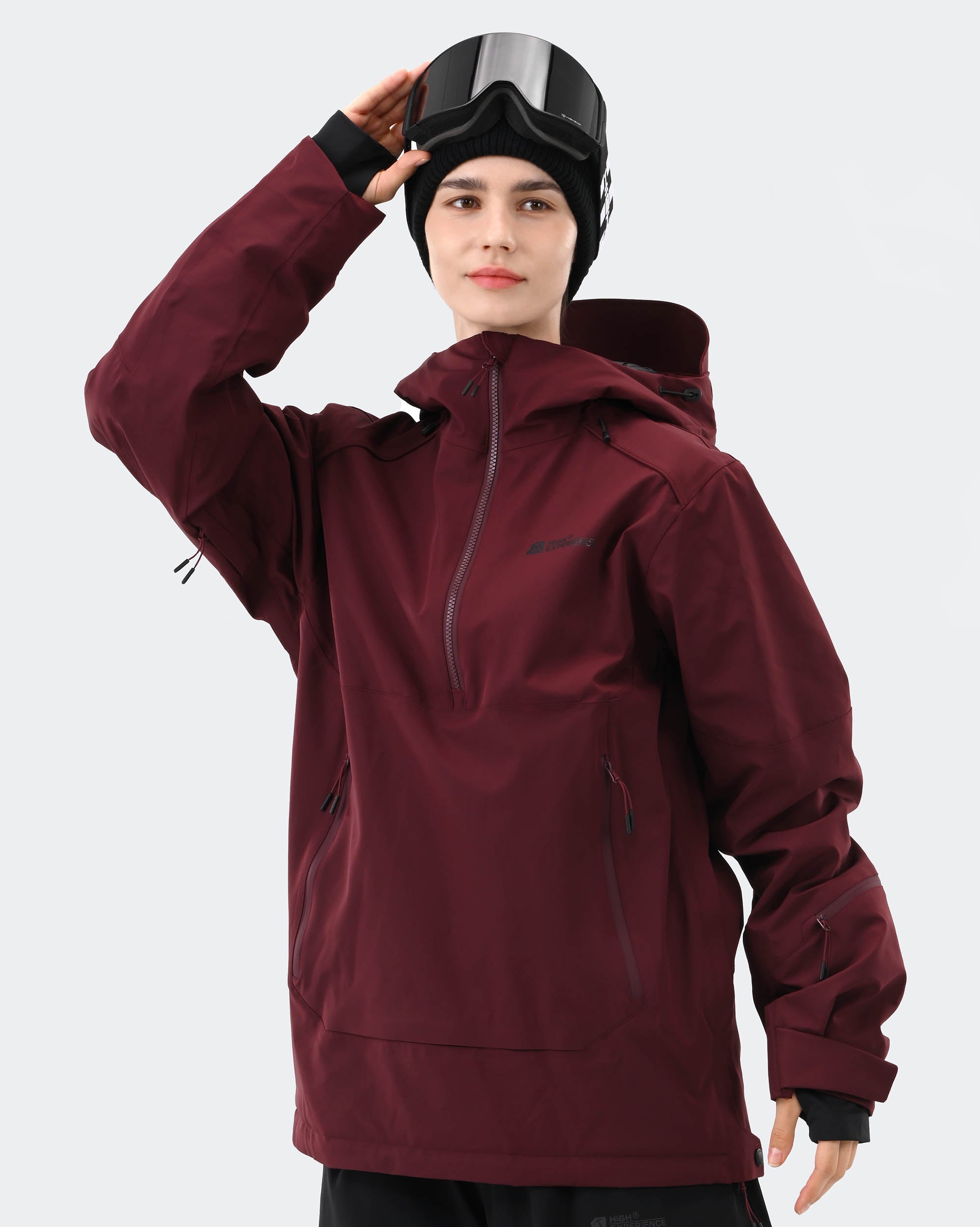 Red 3-layer ski jacket side profile showing windproof construction
