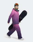 Purple ski jacket goggle pocket and zippered hand pocket detail
