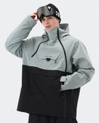Greenish Blue Black anorak ski jacket side profile showing windproof construction
