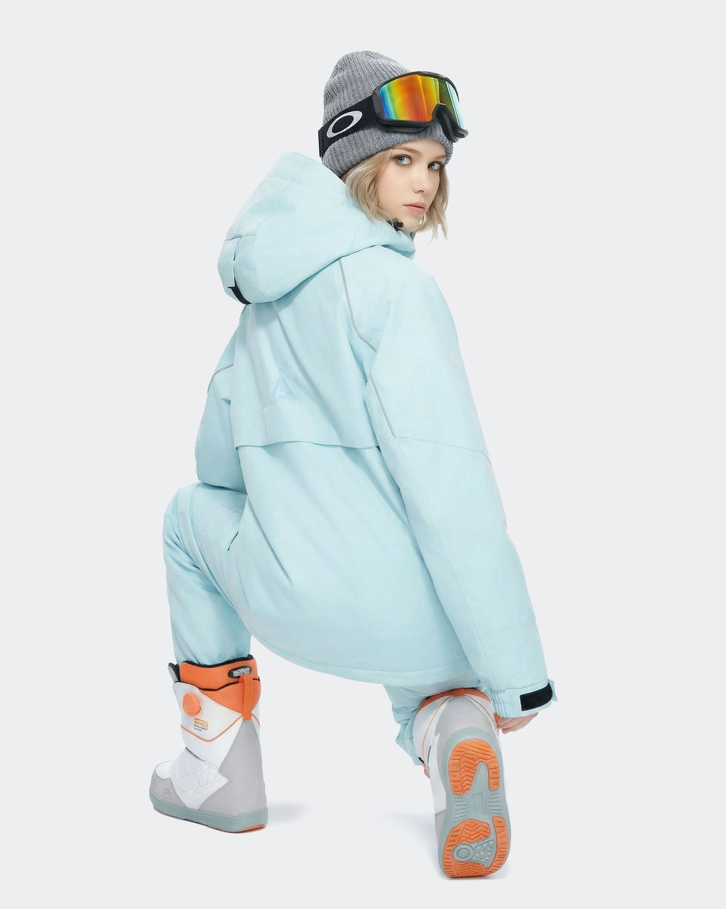 Light Blue women's ski jacket back view – snowboard outerwear
