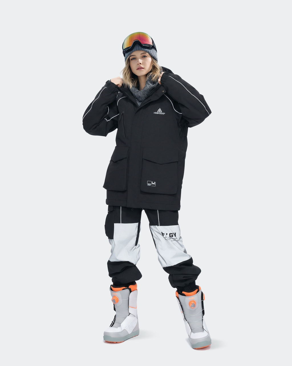Women's Black ski jacket side view showing fit and silhouette
