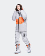 Gray ski jacket windproof cuff and ventilation zipper detail
