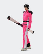 Women wearing Pink Gradient one-piece waterproof ski suit powder day
