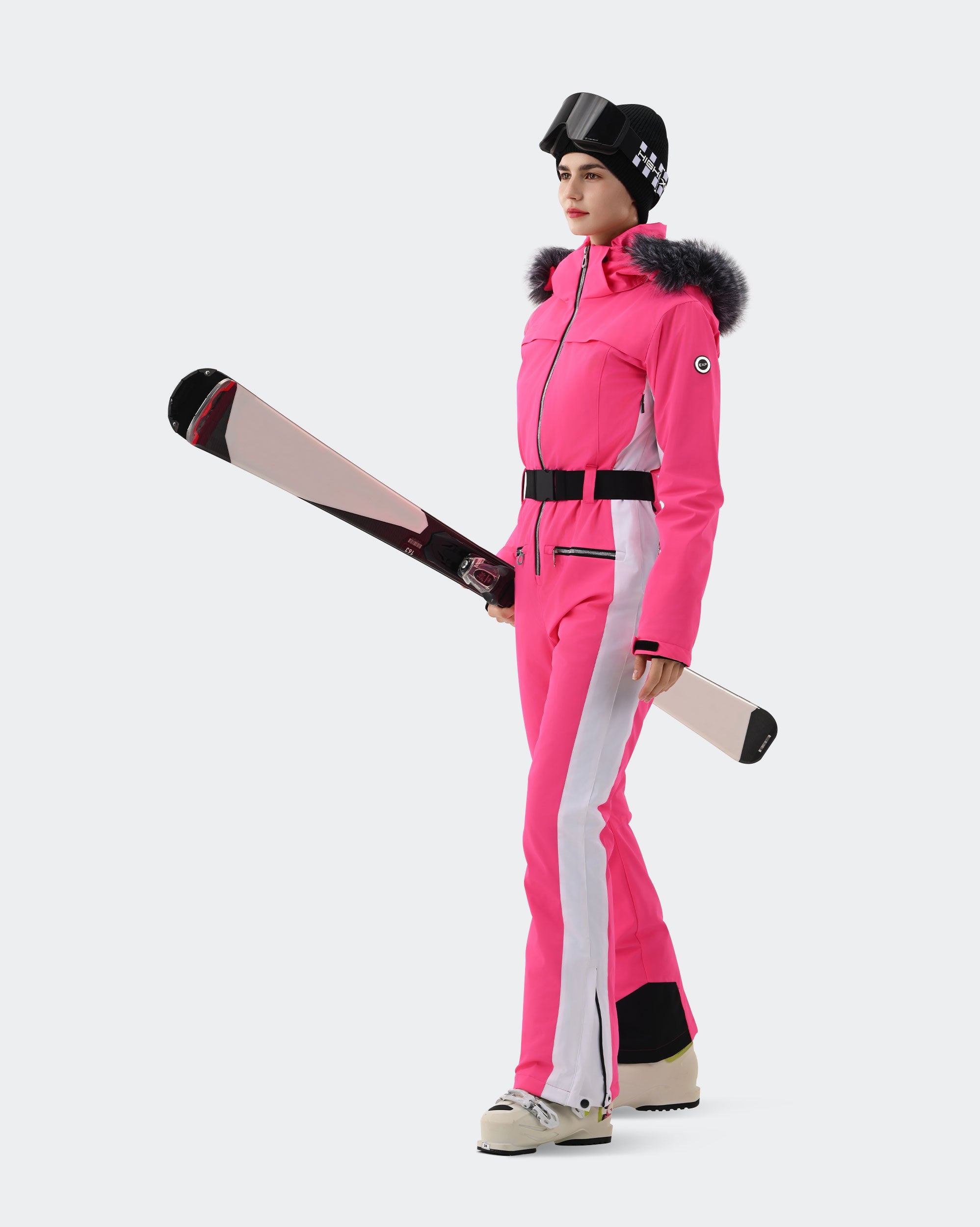 Women wearing Pink Gradient one-piece waterproof ski suit powder day
