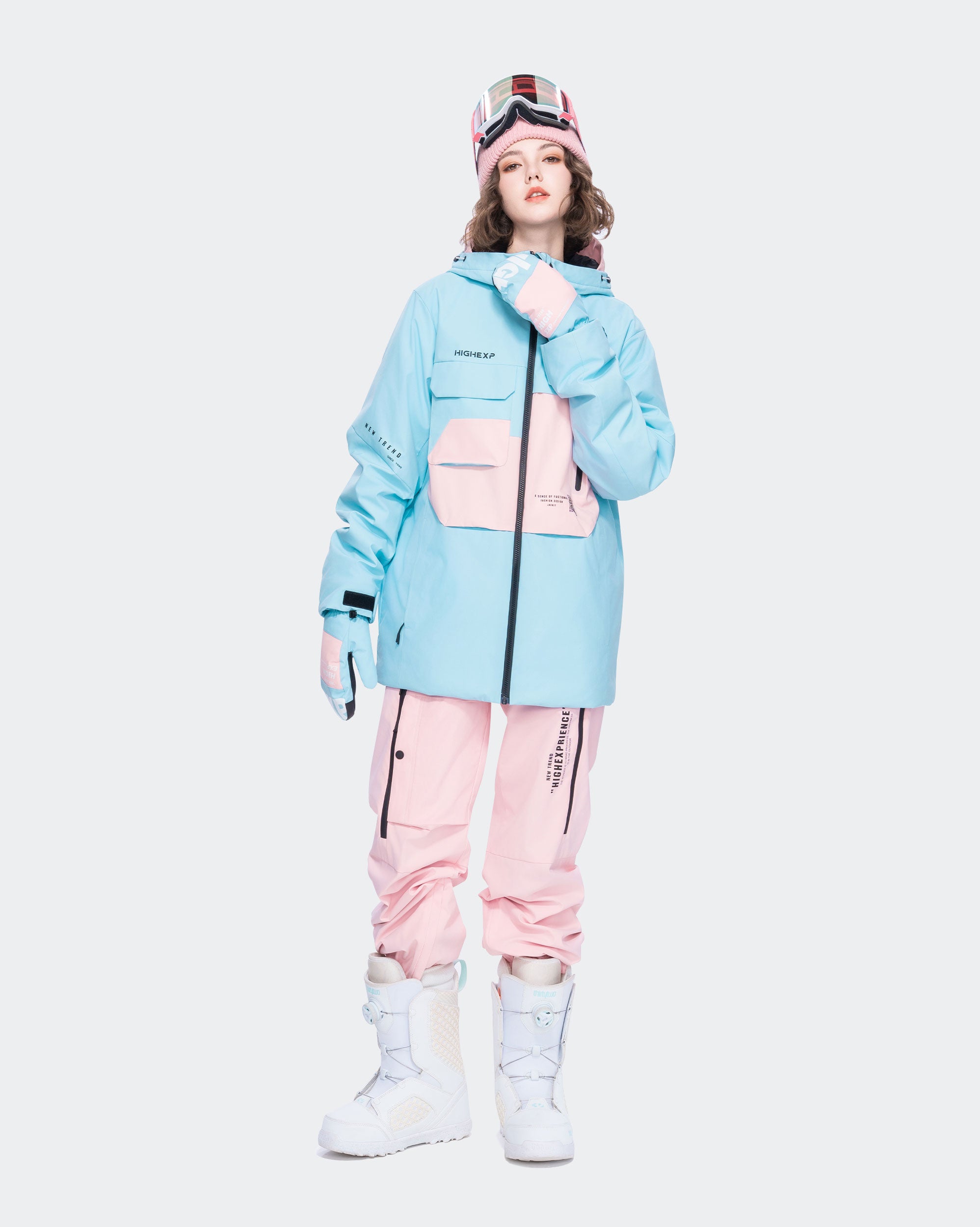 Women wearing Blue baggy snowboard jacket backcountry adventure
