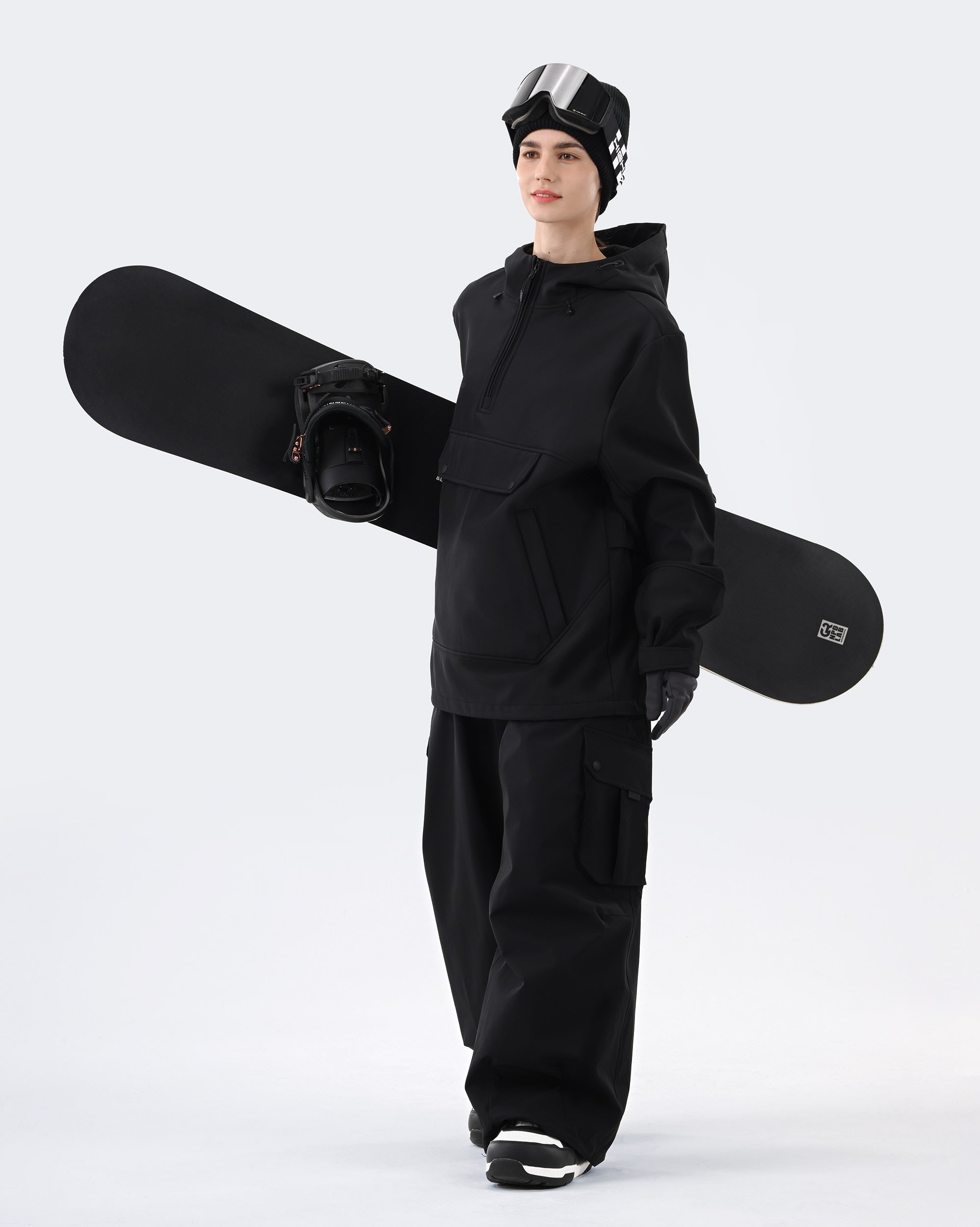 Women wearing Black waterproof ski hoodie pullover on mountain
