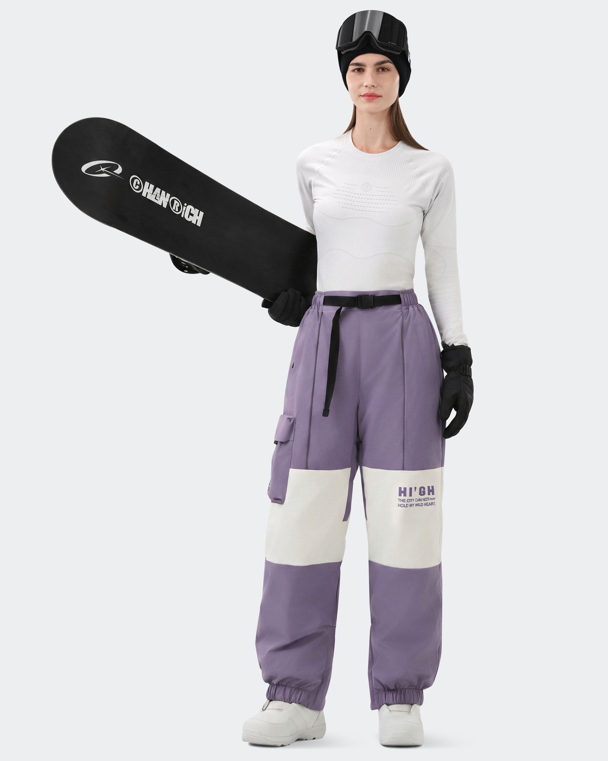 HIGH EXPERIENCE Women's Baggy Ski Pants Purple On Model with Board — Waterproof Snowboard Pants