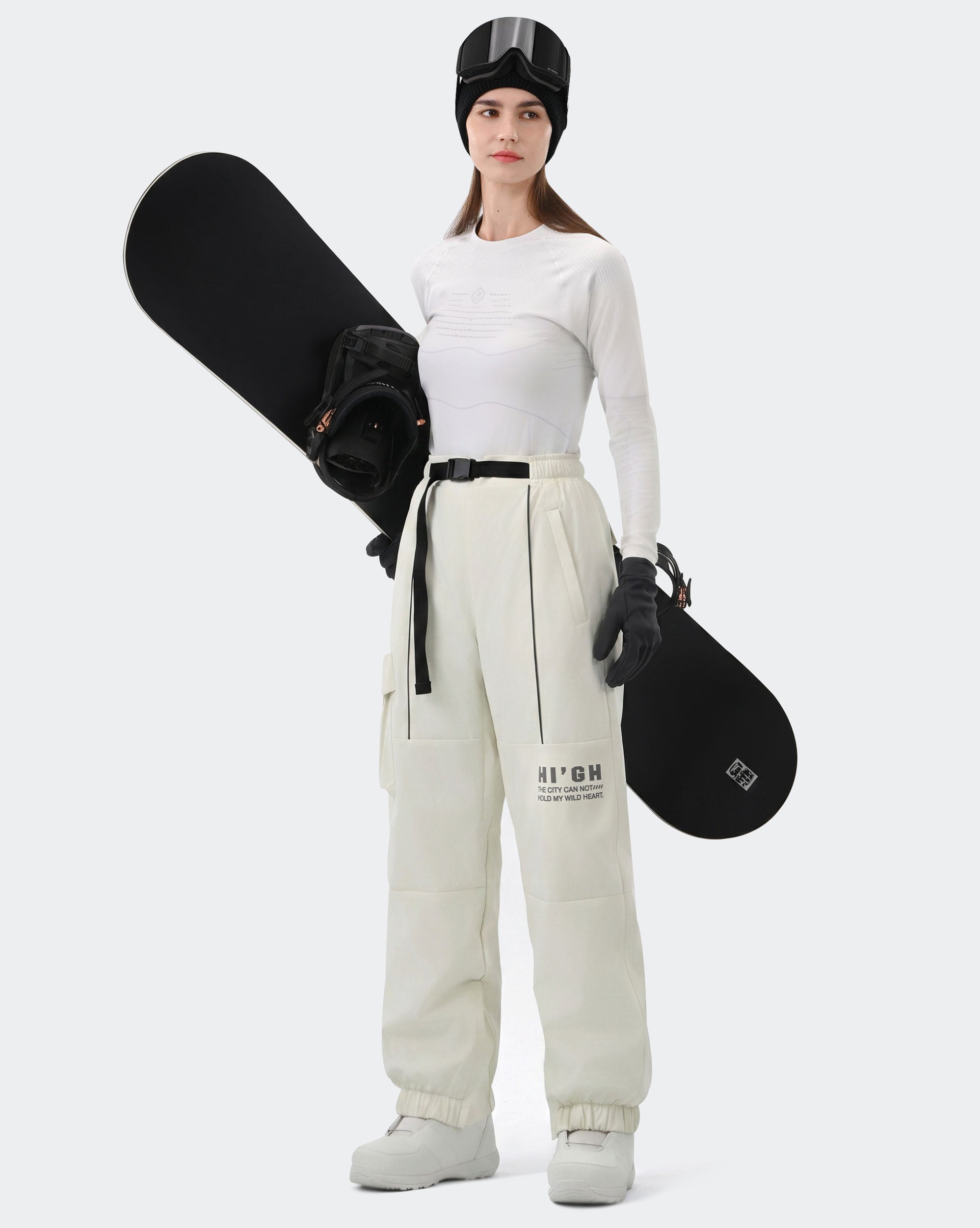 HIGH EXPERIENCE Women's Baggy Ski Pants Cream White On Model with Board — Waterproof Ski Pants