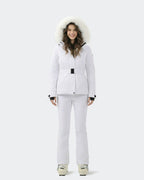 Women wearing White belted waterproof ski jacket backcountry adventure
