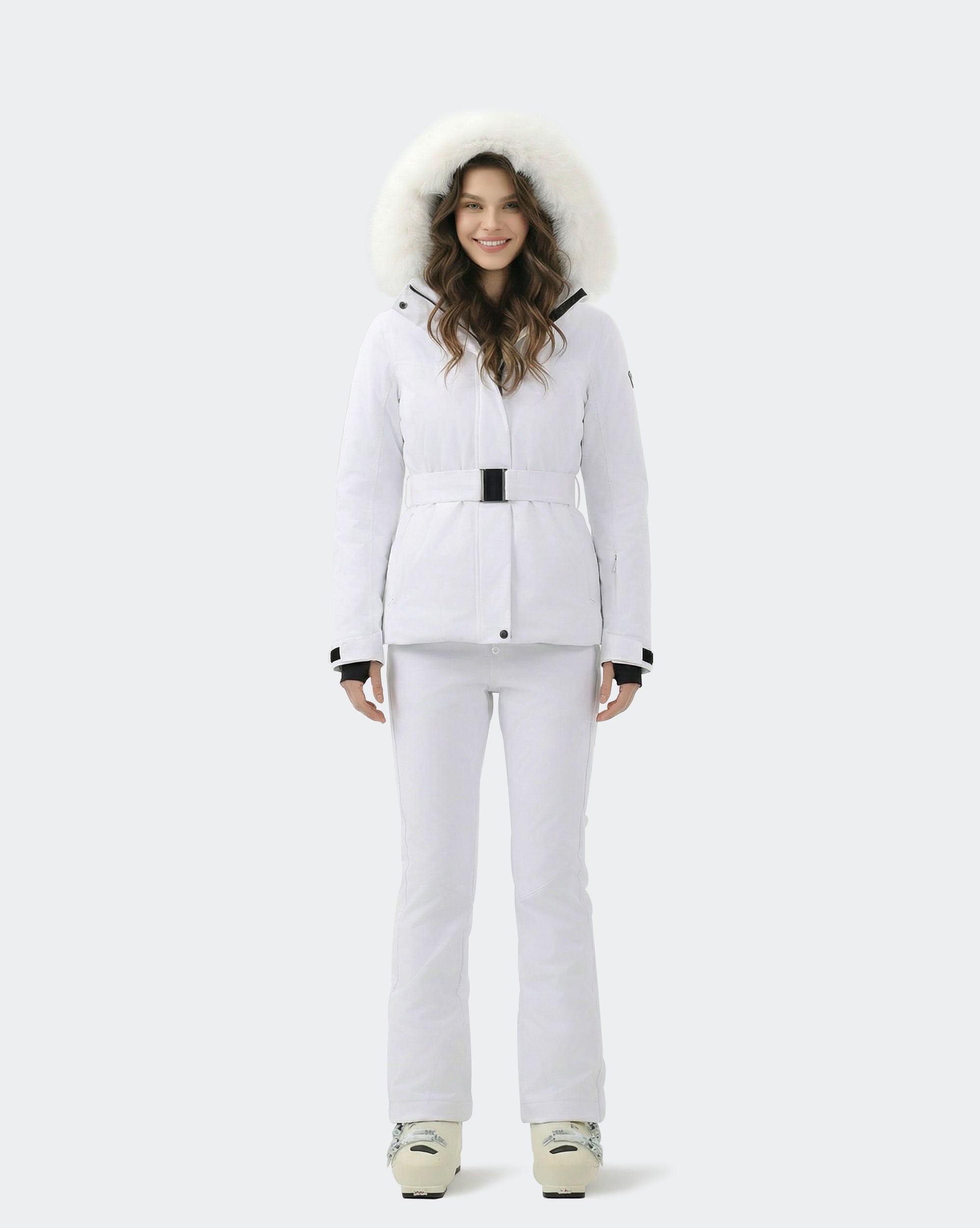 Women wearing White belted waterproof ski jacket backcountry adventure
