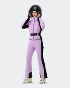 Women wearing Black-Purple one-piece waterproof ski suit backcountry adventure
