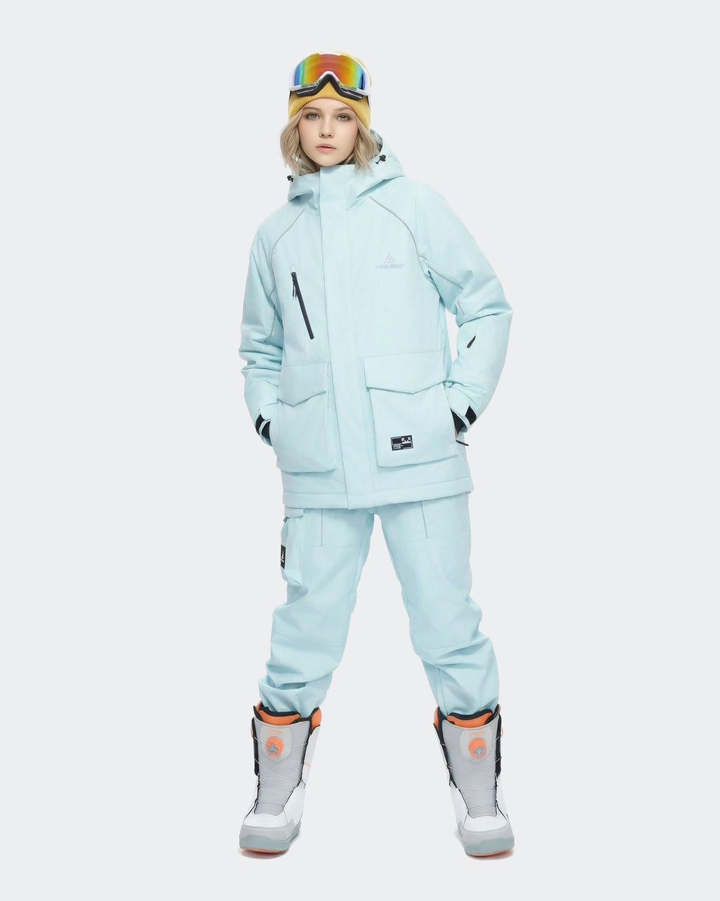 Women wearing Light Blue baggy snowboard jacket – mountain adventure
