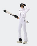 Woman wearing White one-piece insulated ski suit outdoor lifestyle shot

