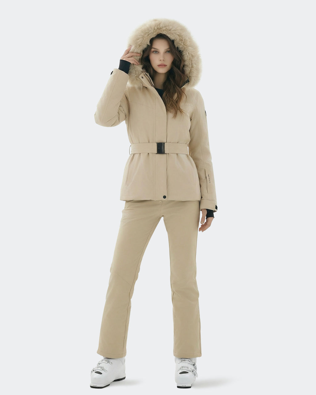 Women wearing Light Khaki belted ski jacket winter outdoor shot
