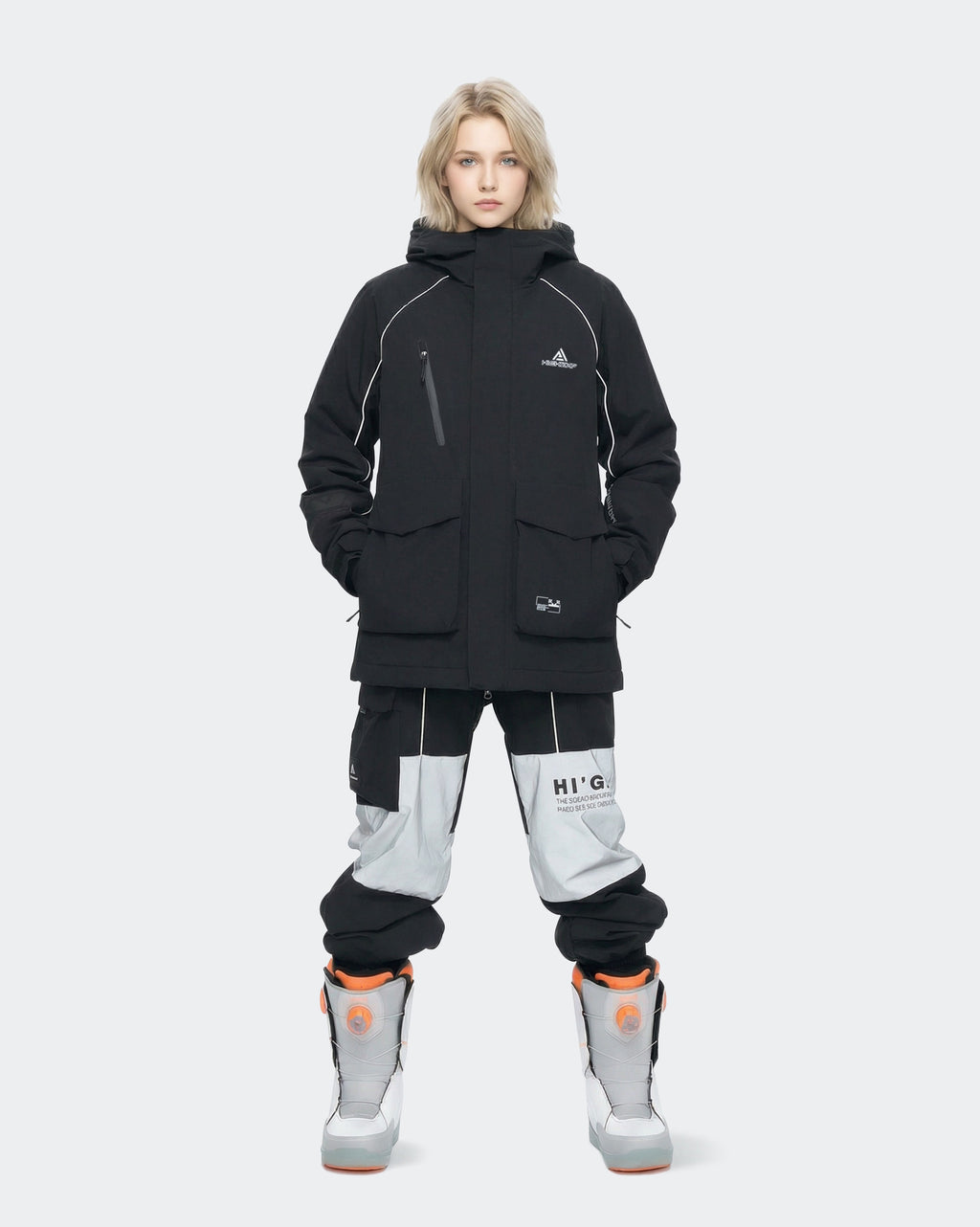 Women wearing Black baggy snowboard jacket outdoor lifestyle shot
