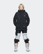Women wearing Black baggy snowboard jacket outdoor lifestyle shot
