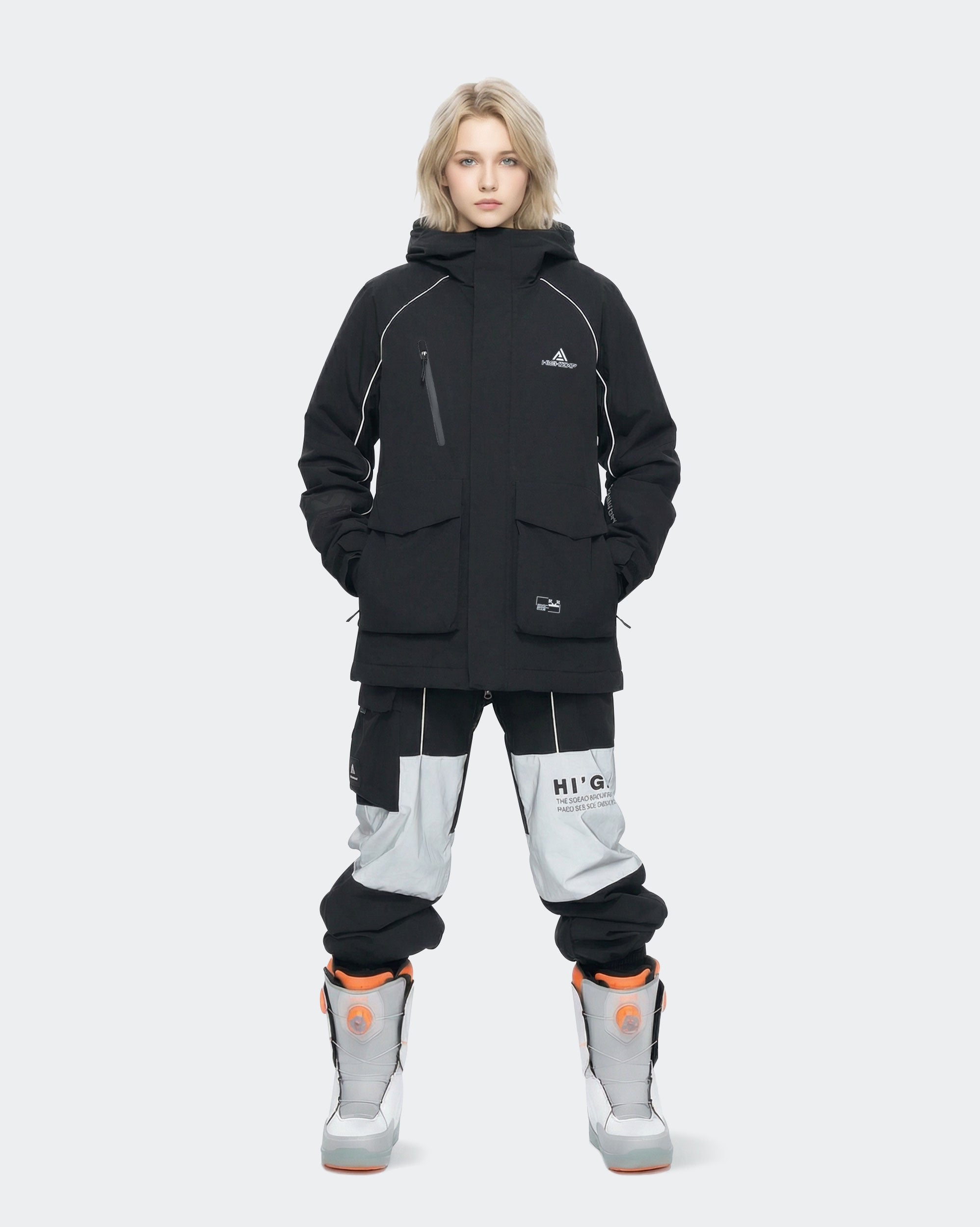 Women wearing Black baggy snowboard jacket outdoor lifestyle shot
