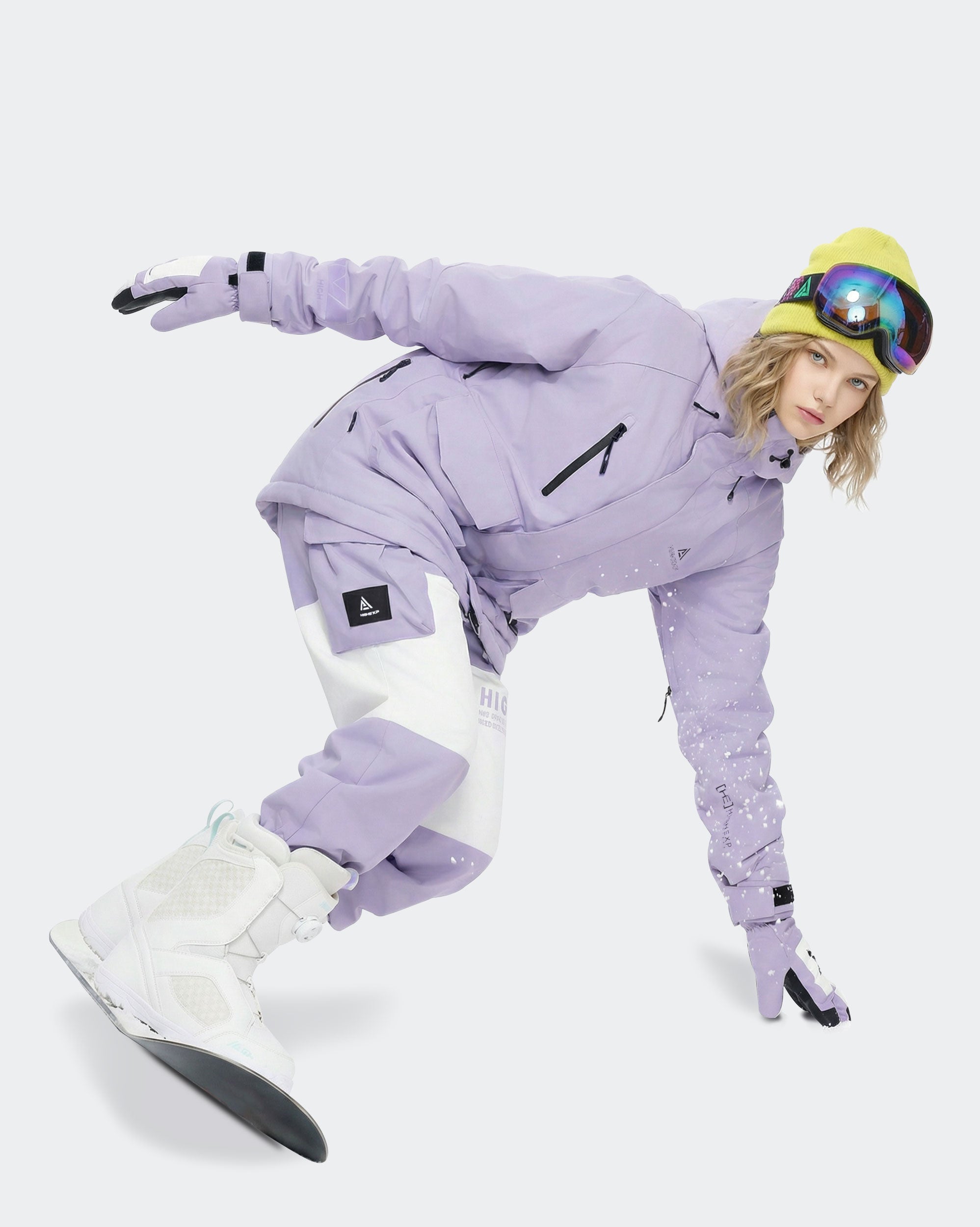 Women wearing Light Purple waterproof ski jacket in snow
