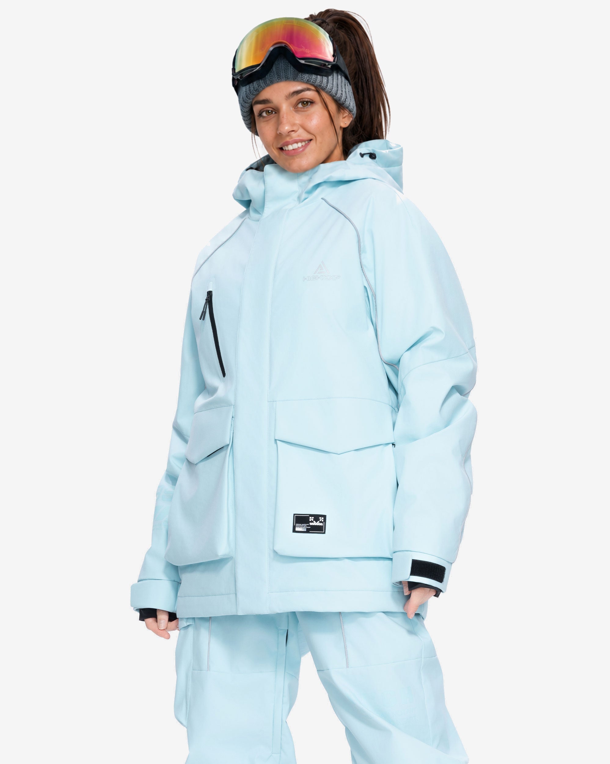 Women's baggy ski jacket front view in Light Blue – HIGH EXPERIENCE
